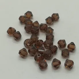 Swarovski - Cristalli bi-cono 4 mm - Smoked Topaz (10 pz)